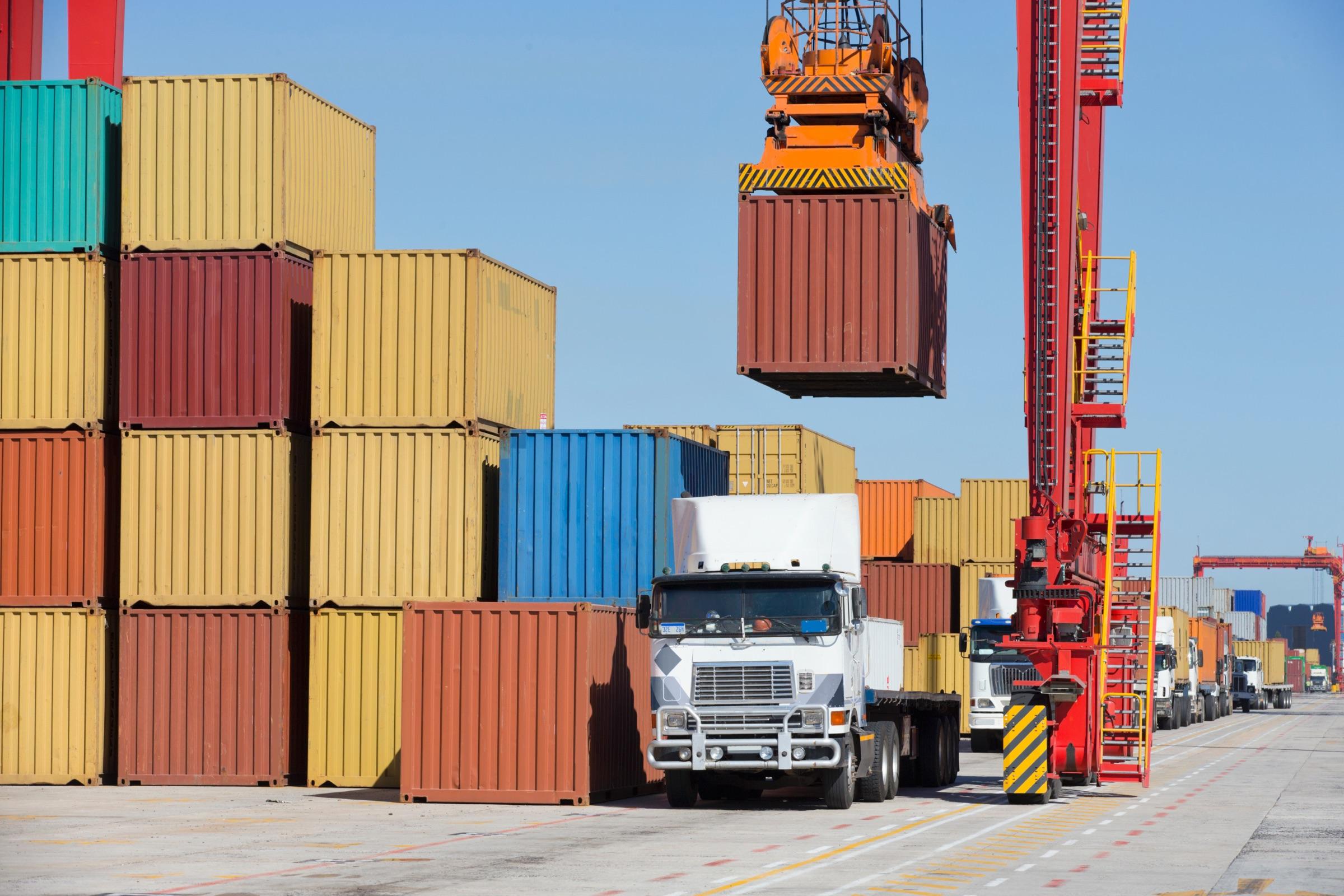 Shipping containers stacked at a port terminal